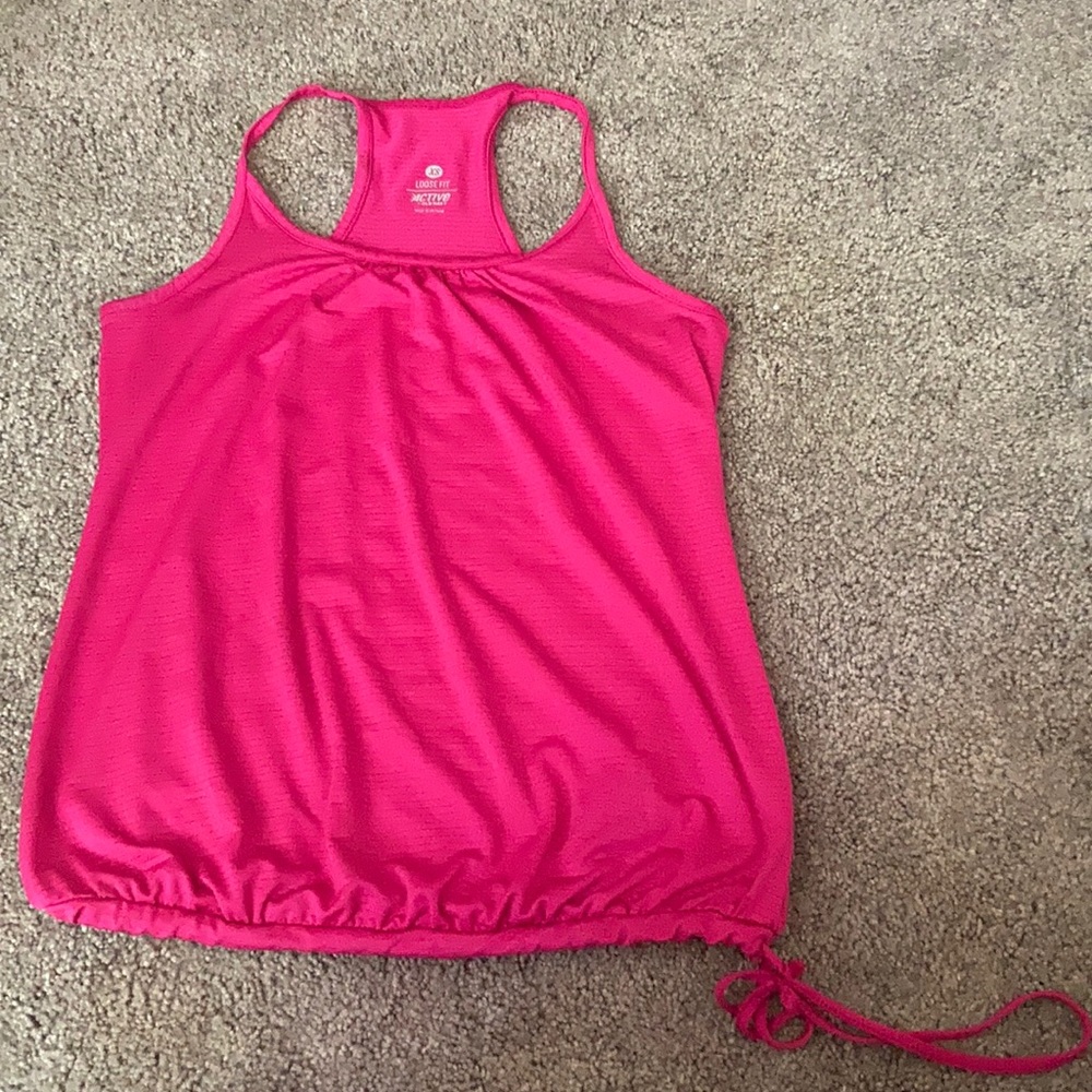 We are selling a pink exercising shirt